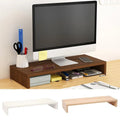 Stando Alder Edge-Stitched Solid Wood Desk Riser on a minimalist home office desk
