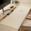 Stando Atelier Slimline Vegan Leather Desk Pad on a minimalist home office desk