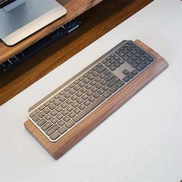 Stando Repose Edge-Stitched Walnut Wrist Rest on a minimalist home office desk